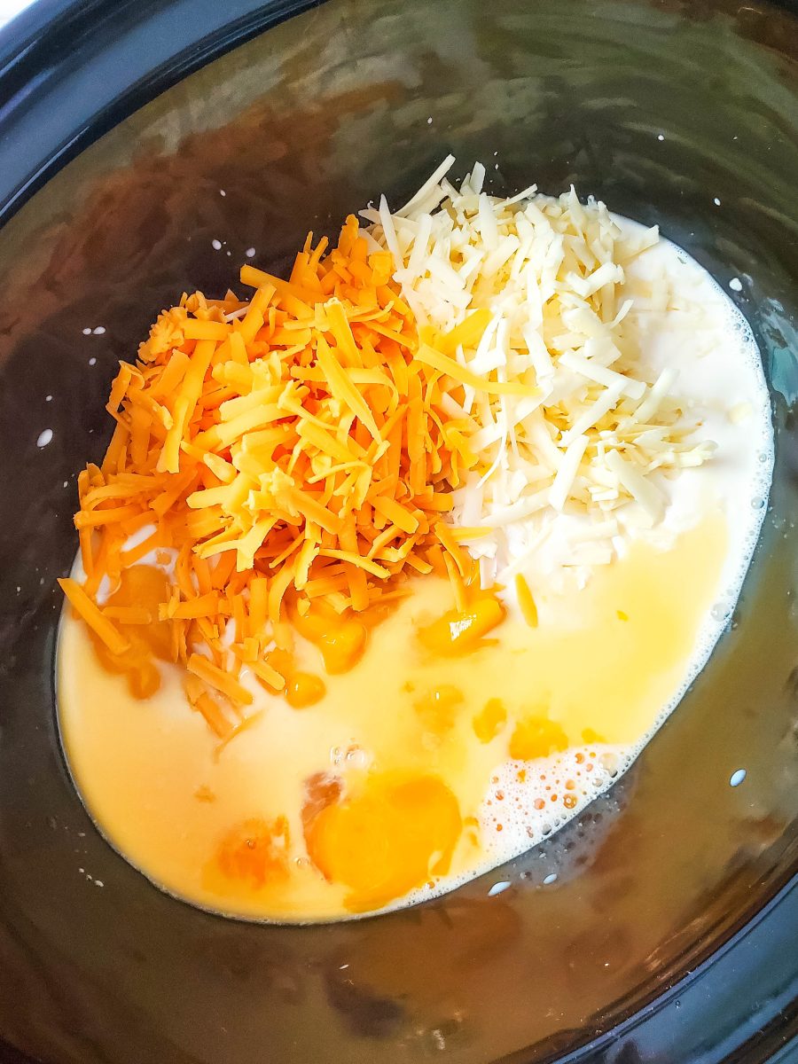 add shredded cheese to slow cooker