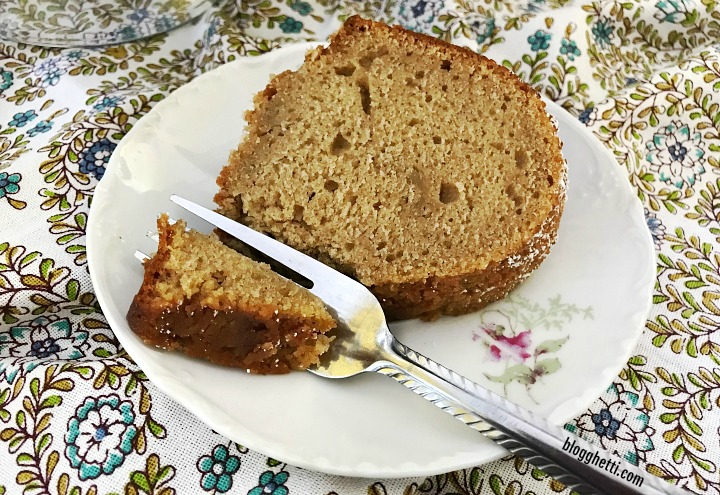 slice of apple butter bundt cake on a white china plate
