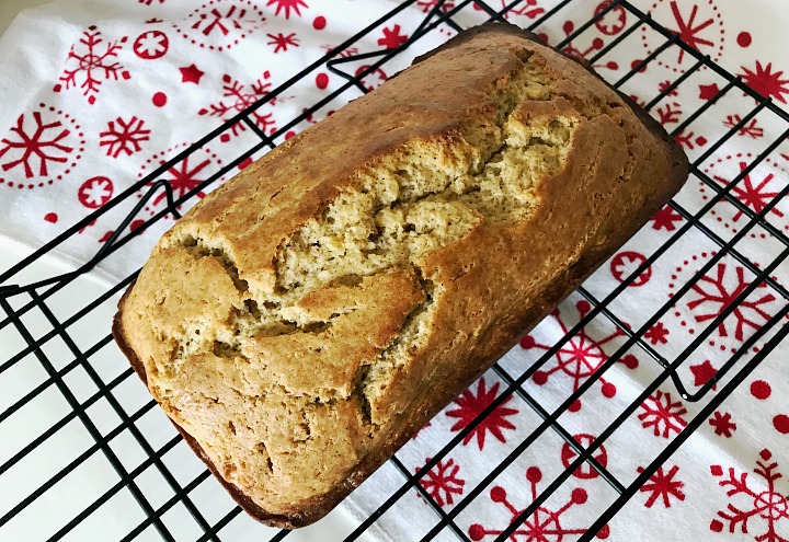 Eggnog bread loaf cooling on wire rack