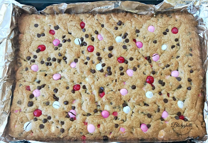 Valentine's M&M Cookie Bar baked and cooling in pan