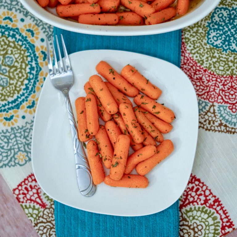 feature image for roasted garlic butter carrots