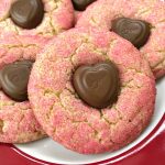 red plate filled with Valentine's Day Crinkle Cookies