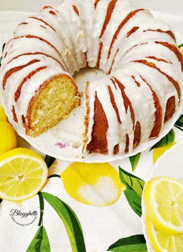 Easy Lemon Bundt Cake with Lemon Glaze with slice taken out