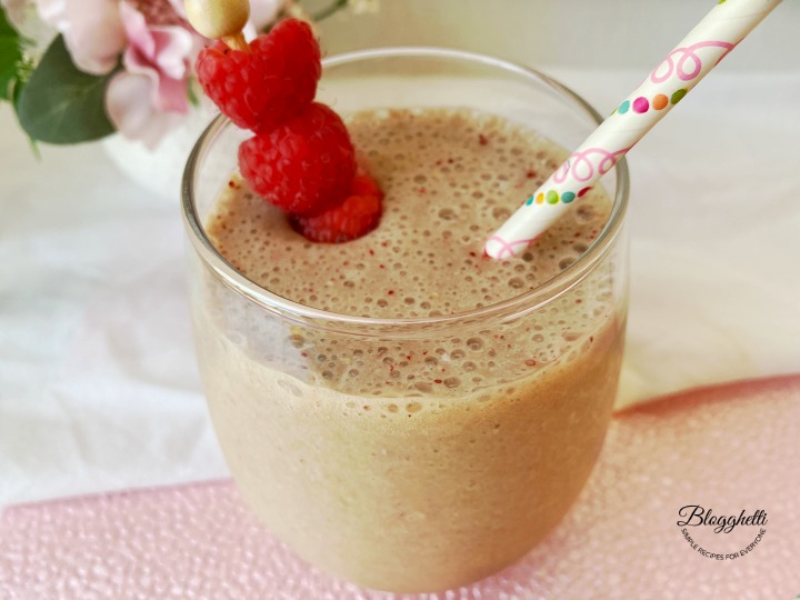 close up of raspberry almond coffee smoothie