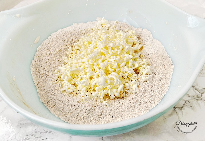 flour mixture and frozen grated butter for scone dough