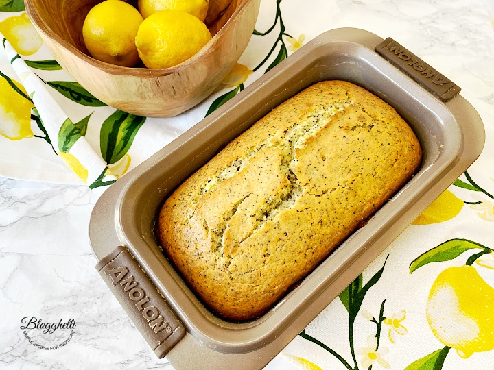 fresh out of the oven lemon poppy seed loaf in baking pan