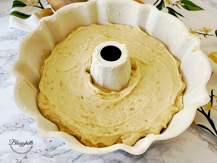 lemon bundt cake batter in baking pan