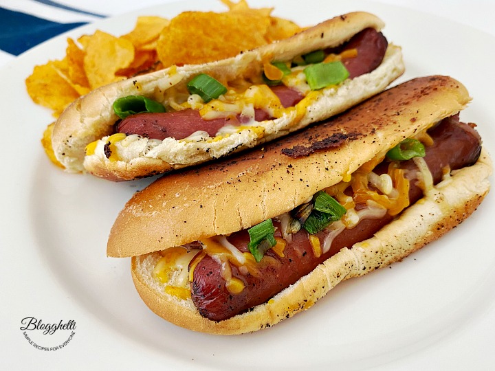 easy grilled cheese hot dogs on white plate