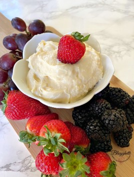 Easy fruit dip on platter with fresh fruit