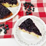 slice of blueberry upside down cake on plate
