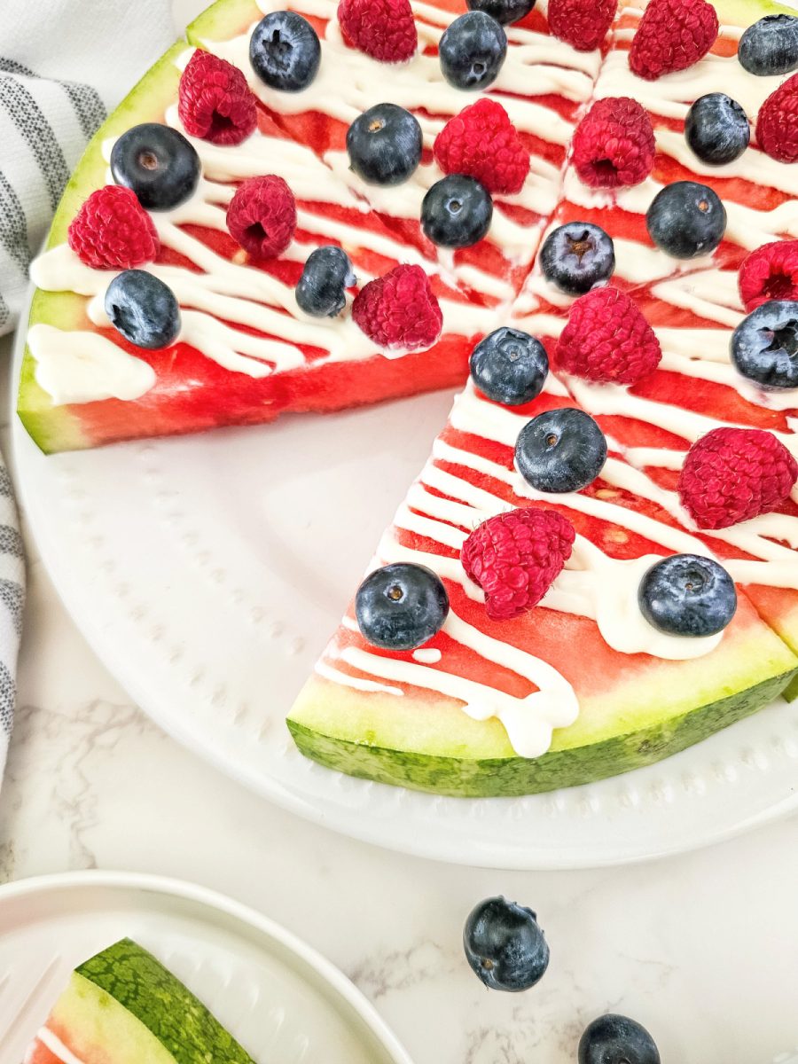 fruit pizza made on a slice of watermelon