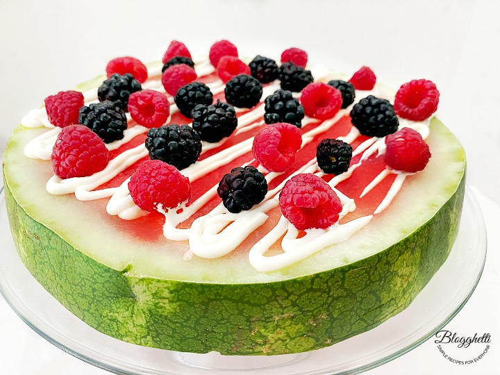 fruity watermelon pizza with cream cheese drizzle