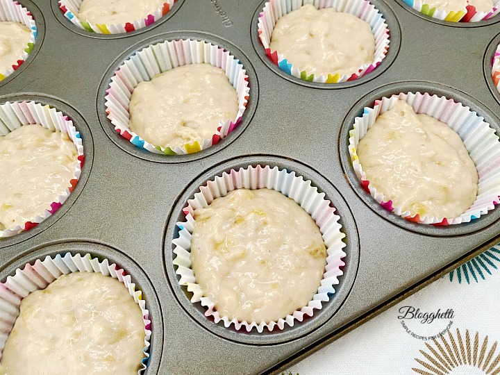 muffin cups filled with banana batter