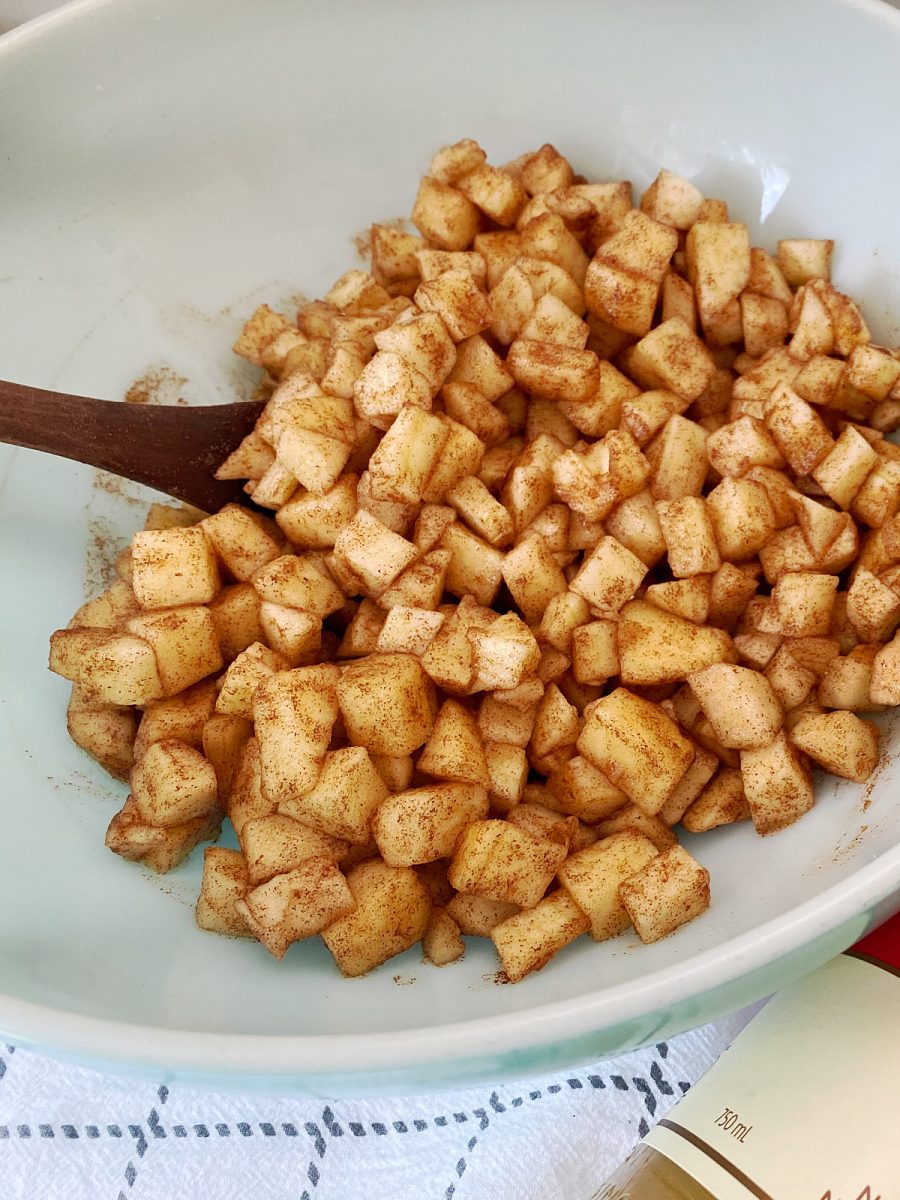 apples and cinnamon in bowl