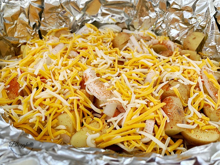 layered potatoes and cheese for loaded potatoes