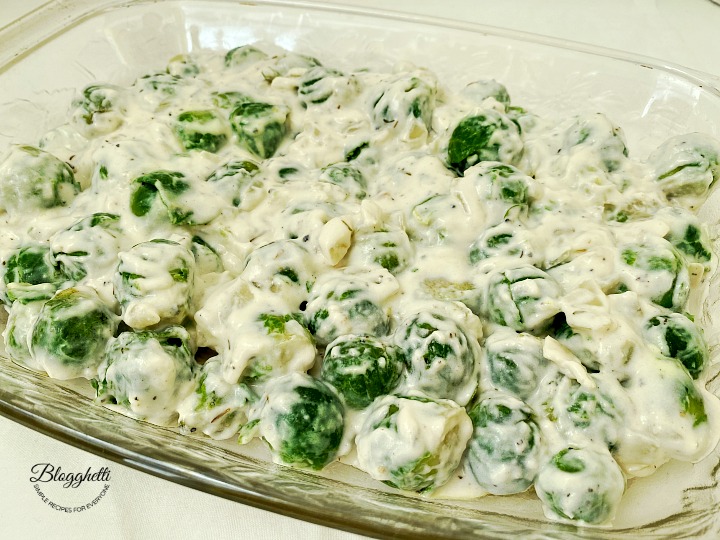 Brussels Sprouts in a creamy sauce ready to bake