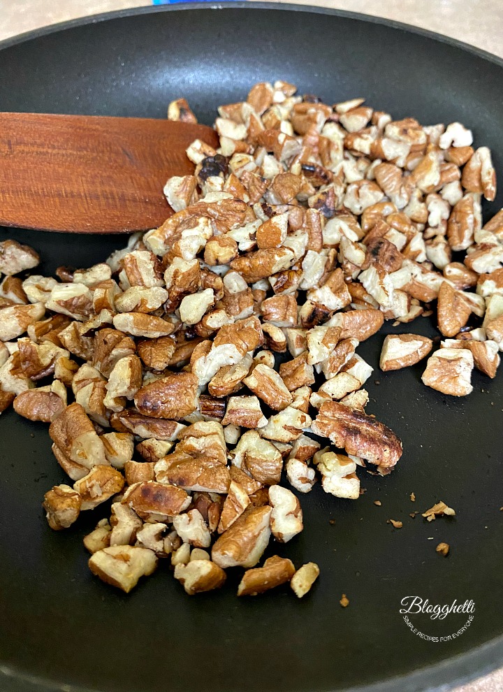 toasted pecans in skillet