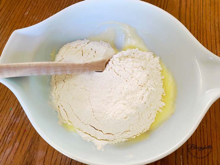 Adding dry ingredients to cookie batter