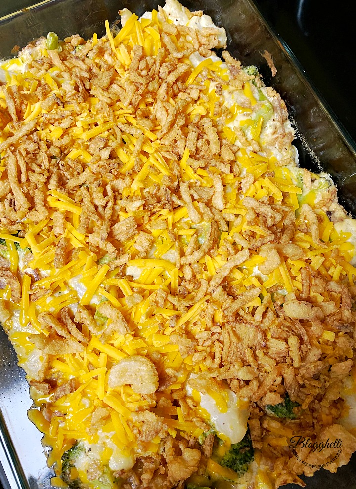 adding extra cheese and fried onions to top of casserole
