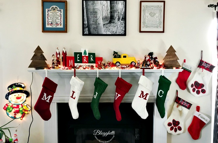 fireplace mantle decorated for Christmas
