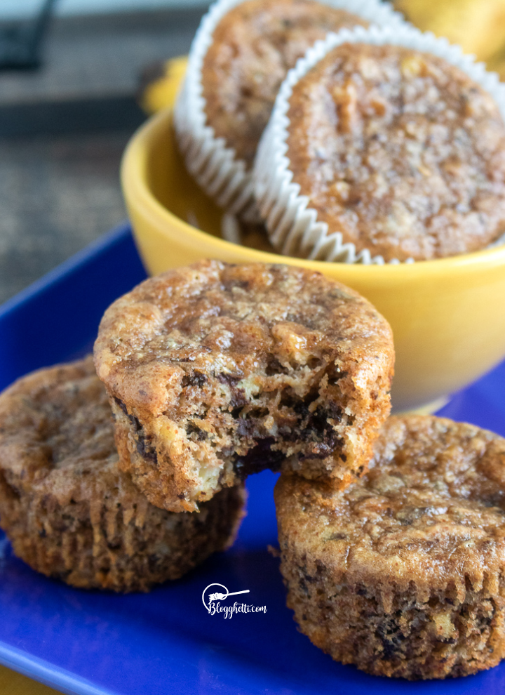 Healthy Banana Chocolate Chunk Muffins on blue plate