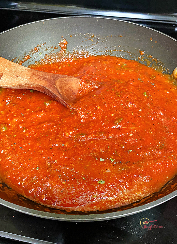 spaghetti sauce simmering on stove top