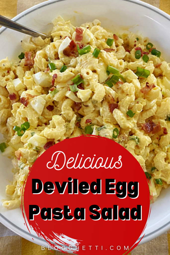 bowl of deviled egg pasta salad with a text overlay