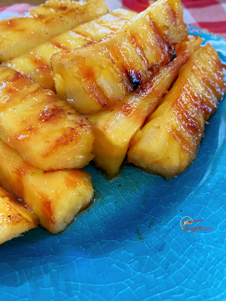 close up of grilled pineapple with maple syrup glaze