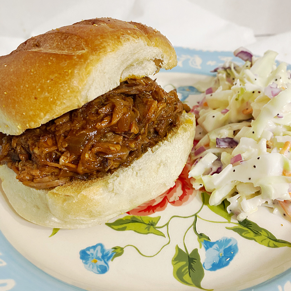 Because this recipe takes about 7 hours to make, it's perfect to start in the morning and it will be ready when you get home. Use whatever BBQ sauce you like or create a homemade one like this Cherry Bourbon BBQ Sauce. There's no need to brown the roast before you place it in the slow cooker, but you definitely do so. Add some sliced jalapenos or pepperoncini peppers to the crock pot for a spicy taste. This recipe is perfect for making ahead of time. Prepare the beef and sauce and store it in the refrigerator until ready to serve. Leftover BBQ beef can be frozen for later. Store it in an airtight container in the freezer for up to 3 months.