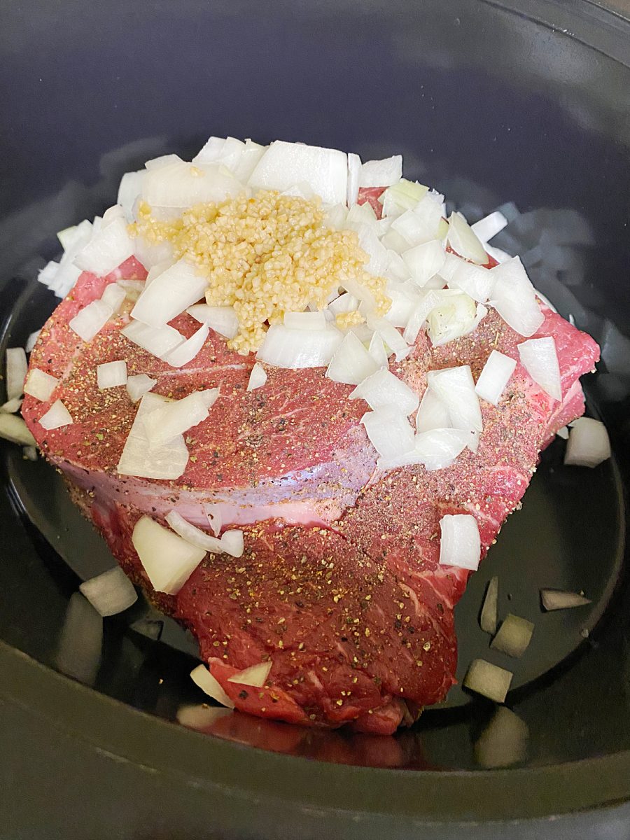 roast in crock pot with onion garlic