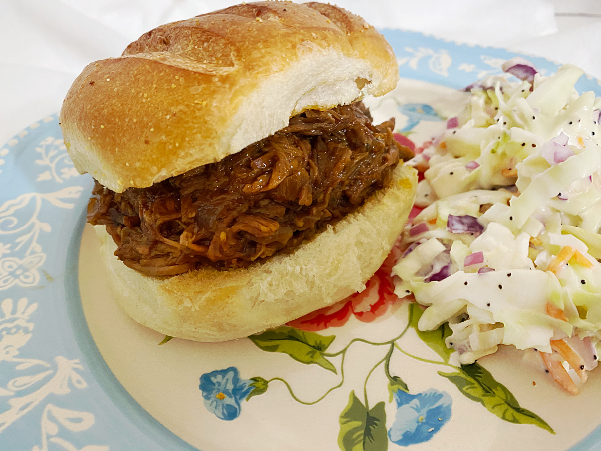 shredded beef with bbq sauces on plate