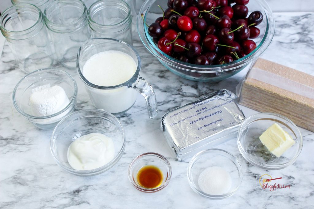 Ingredients for cheesecake in a jar on counter