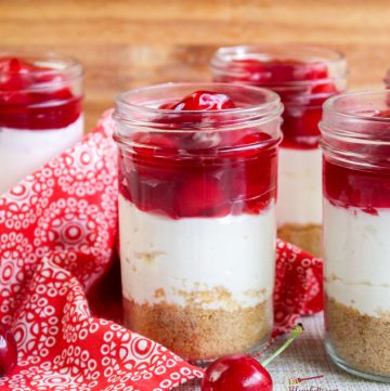 no bake cheesecake with cherries in mason jars
