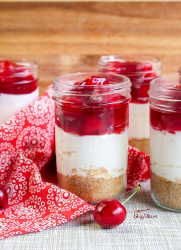 no bake cheesecake with cherries in mason jars