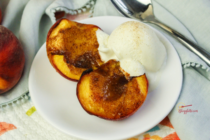 air fried peaches with ice cream on white plate