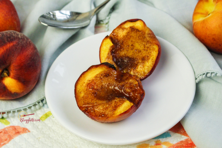plated air fryer peaches with brown sugar filling
