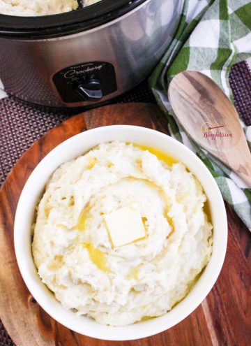 Slow Cooker Mashed Potatoes in white bowl