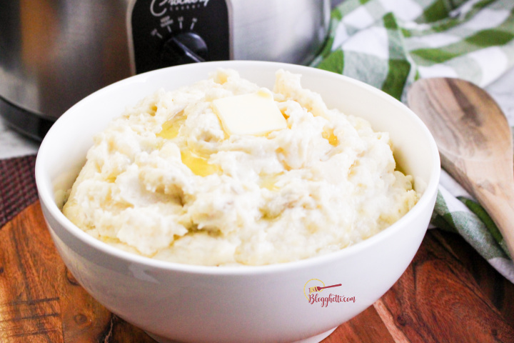 creamy mashed potatoes in large white bowl