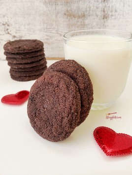 glass of milk with chocolate sugar cookies
