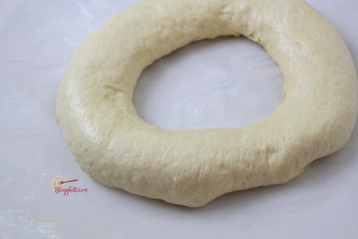 king cake dough formed and ready to bake