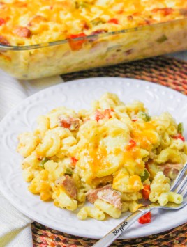 cajun macaroni and cheese casserole - white plate and fork