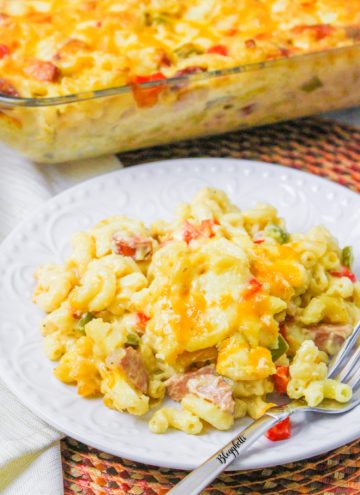 cajun macaroni and cheese casserole - white plate and fork