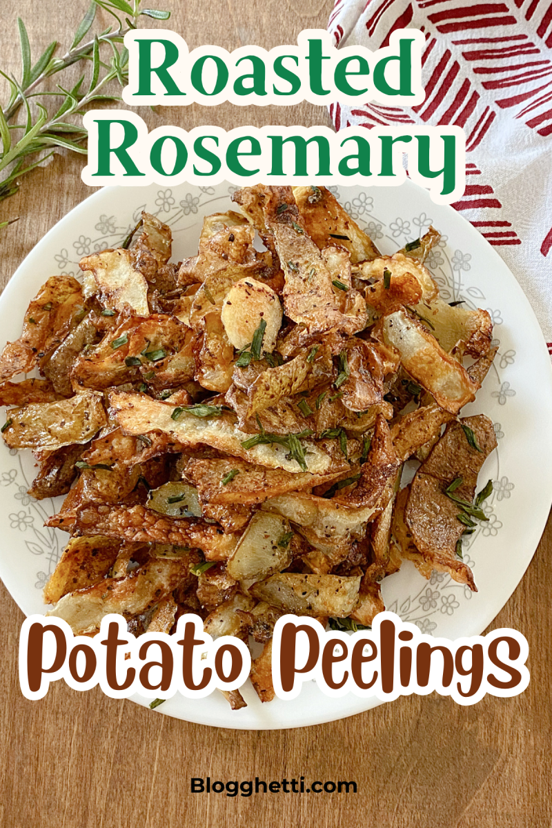 Crispy, golden-brown potato peelings roasted with fresh rosemary, served on a white plate with a sprig of rosemary on top.