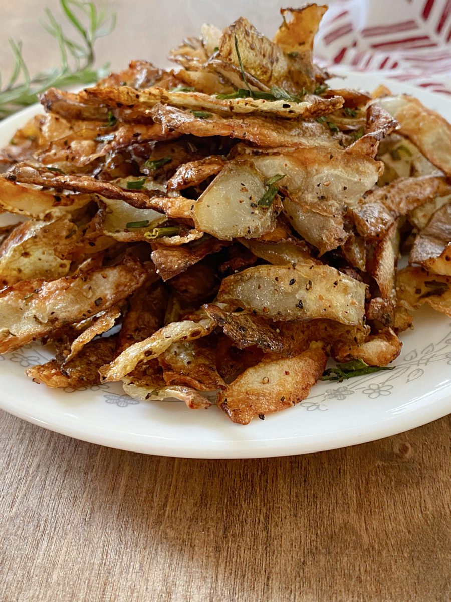 stack of baked peelings from potatoes