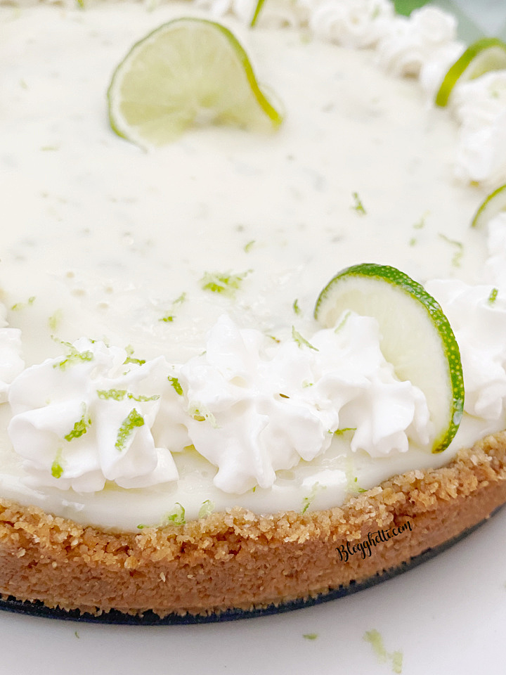 close up of lime pie with graham craacker crust