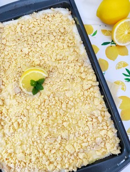 lemon poke cake with lemon cookie crumbles