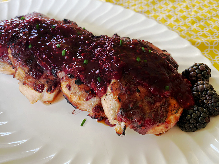 plated grilled chicken with blackberry glaze