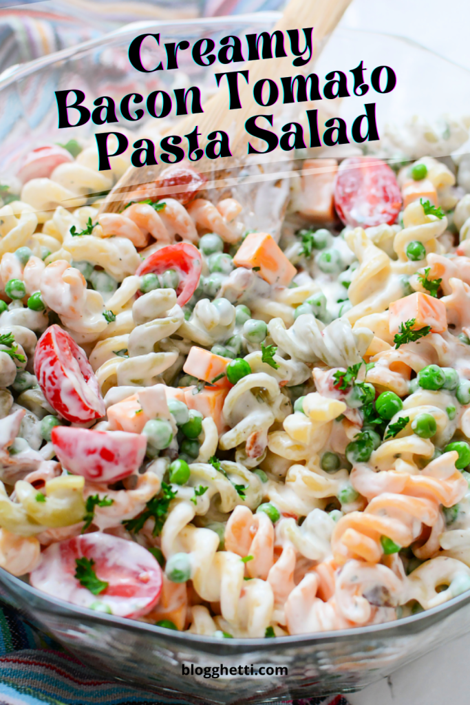 creamy bacon tomato pasta salad image with text overlay