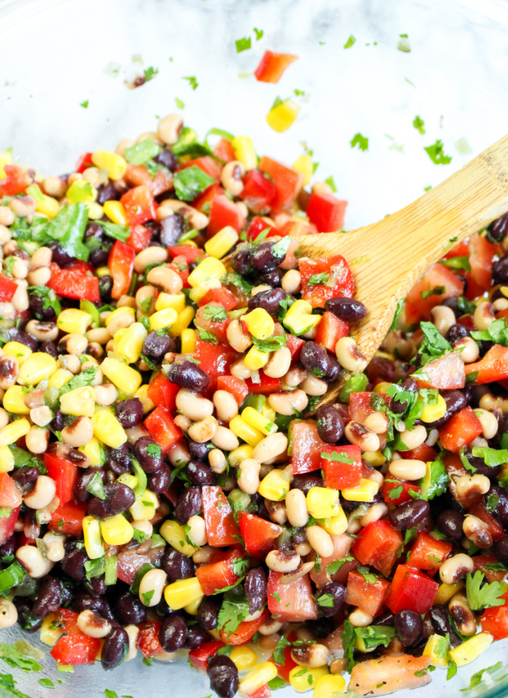 cowboy caviar mixed in bowl with zesty dressing