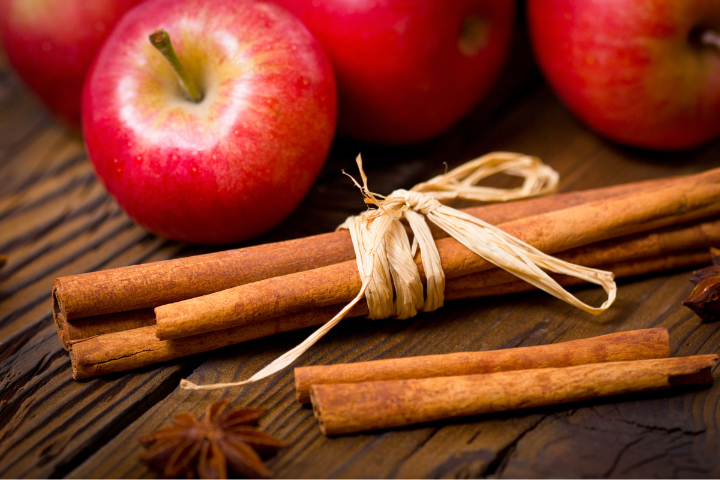 cinnamon sticks and apples